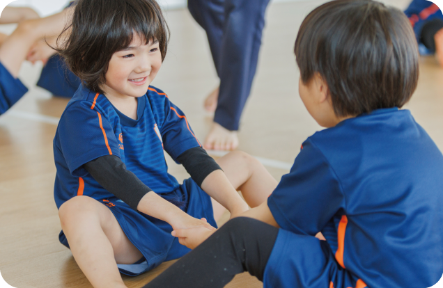 ストレッチする生徒たち